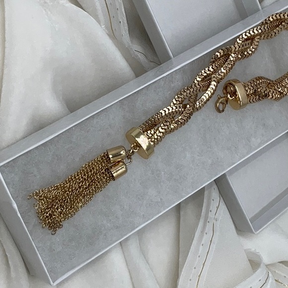 Gold-Tone Braided Bracelet With Two Attached Tassels - Picture 12 of 13